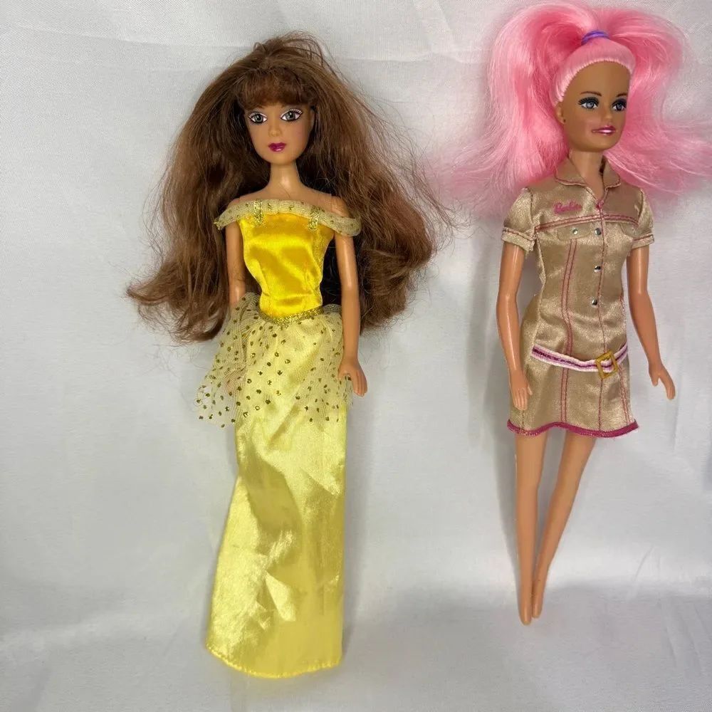 2 Dolls with dresses